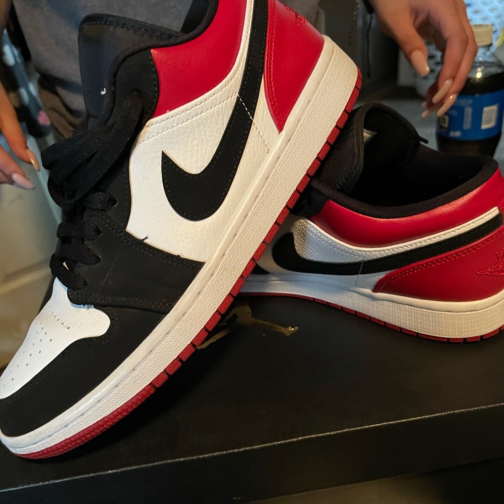 Jordan 1 low black toe